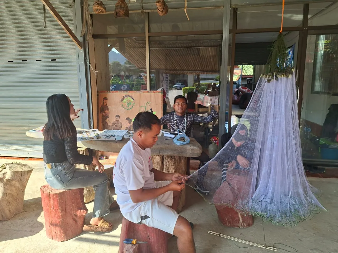 Learning traditional cast-net fishing with a Khmu guide