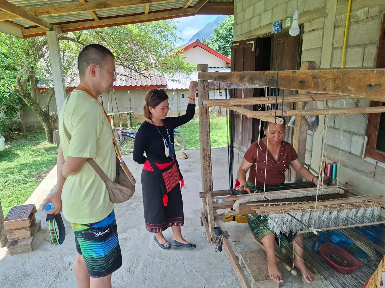 Watching a Khmu weaver at her loom