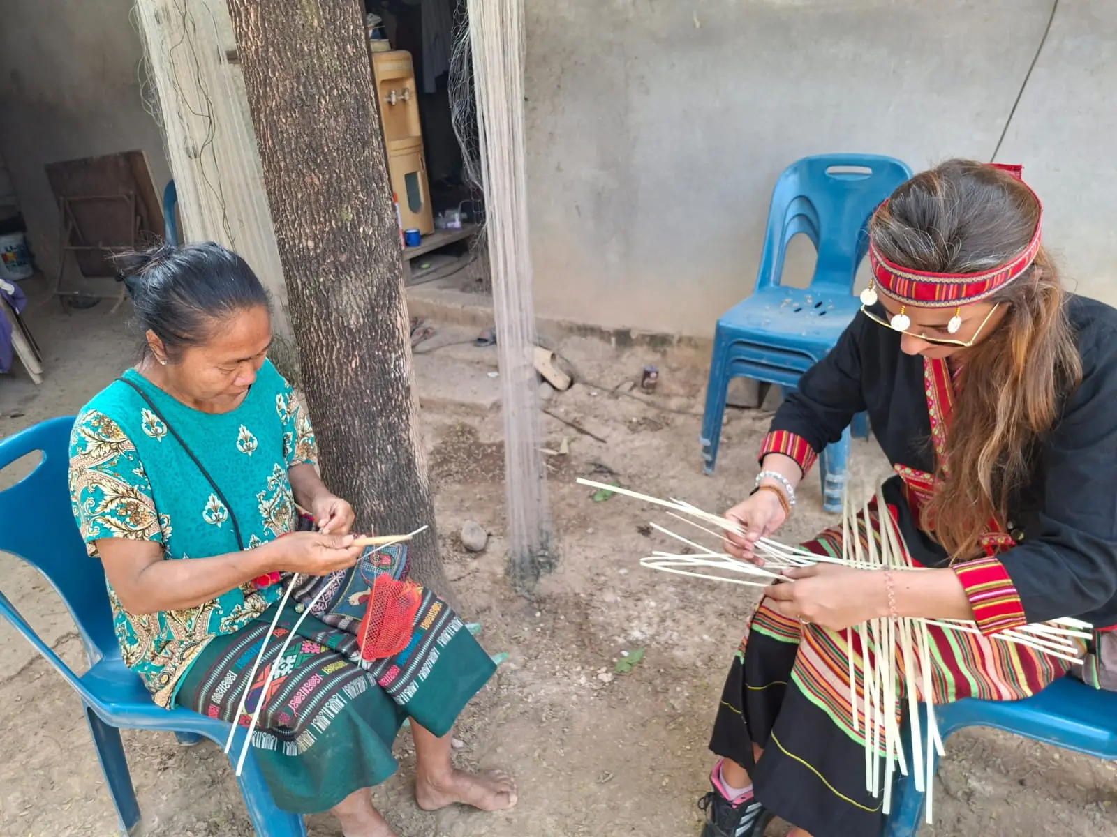 Bamboo handicrafts with a village elder